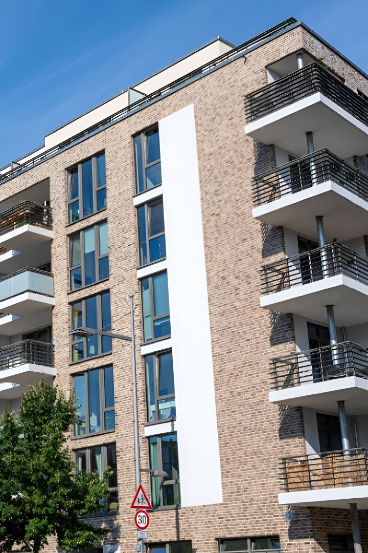 Modern apartment building with balconies.